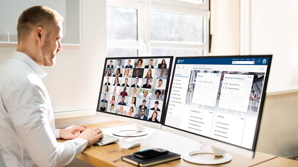 Man working with other participants on a digitization project