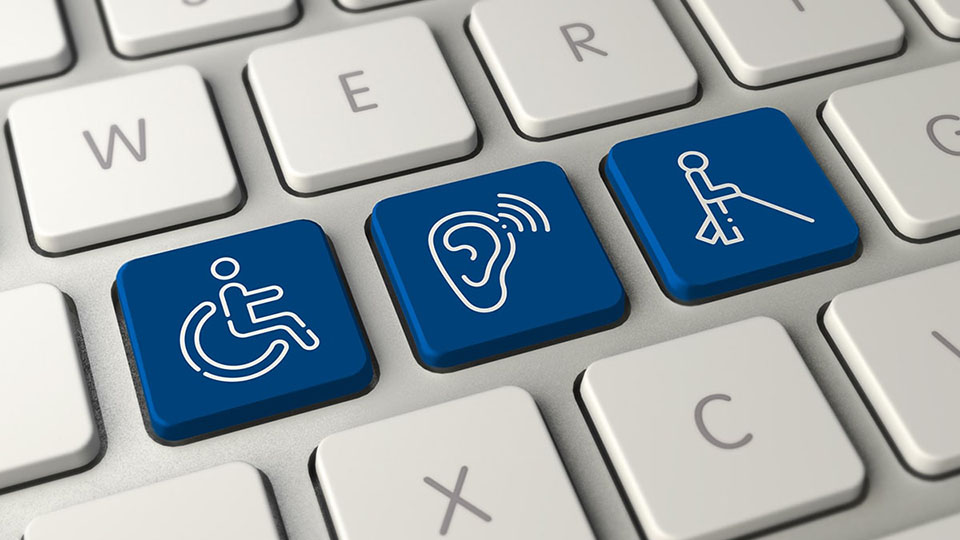Keyboard with white icons for wheelchair users, hearing impaired and blind people on blue background